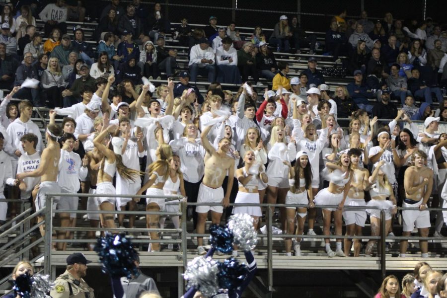 The PV student section cheers on the Spartan football team at their game against Dubuque Hempstead.