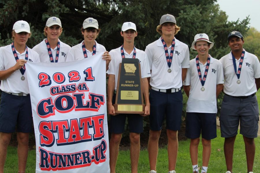 (From left) Sam Johnson, Owen Wright, Connor Borbeck, Nathan Tillman, Jack Kilstrom, Ethan Blomme, and Tarun Annavajula display their team runner-up trophy and banner.
