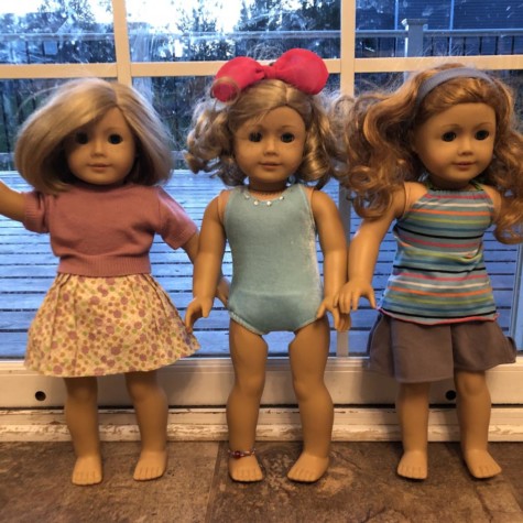 American Girl dolls from 2014 featuring two custom dolls.