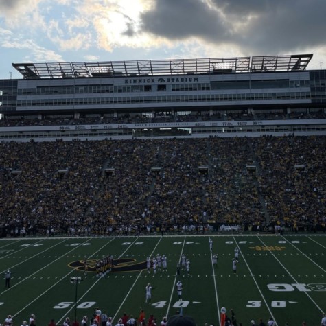 Pictured above, Iowa fans cheer on the Hawkeyes at Kinnick Stadium.