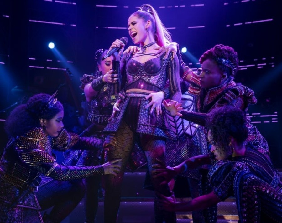 Samantha Pauly (center) performs as Henry VIII’s fifth wife Katherine Howard in Broadway’s production of “SIX.”