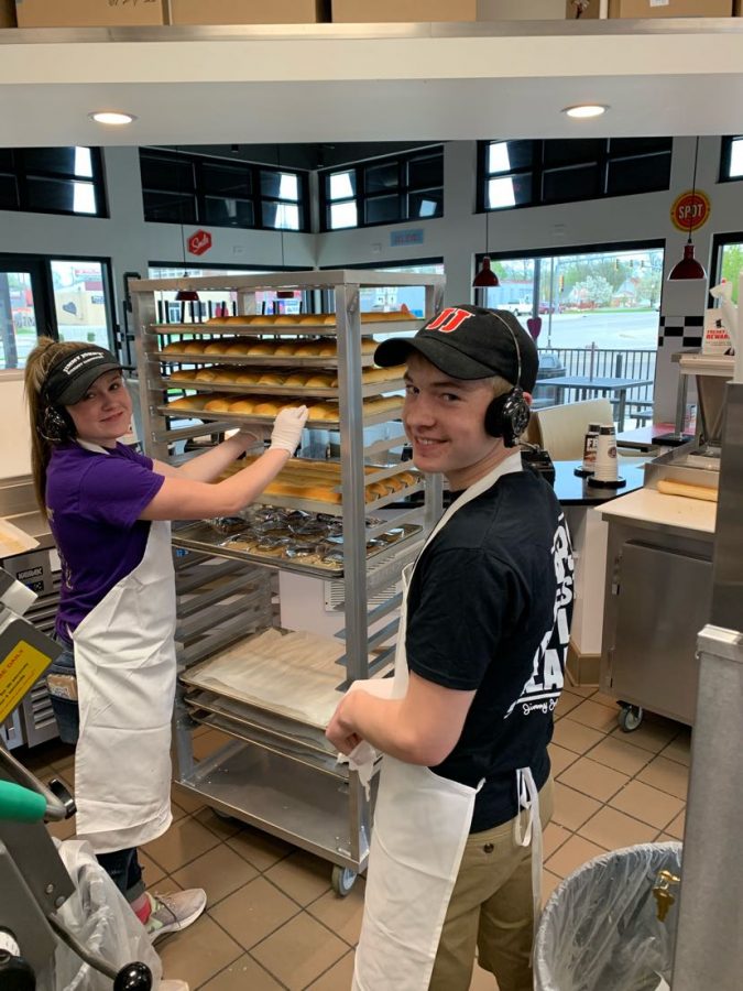 Senior Jahni Harn (left) works with her coworker (right) at Jimmy John’s.
