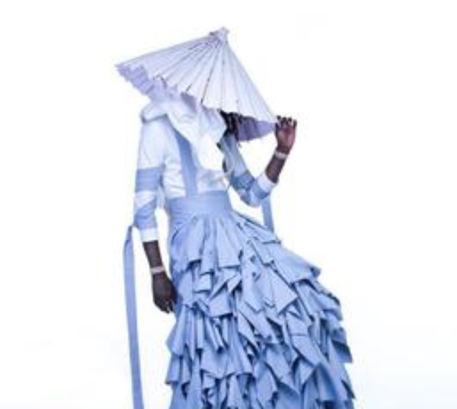 Rapper Young Thug poses on the cover of his 2016 mixtape “JEFFREY” wearing a dress designed by Alessandro Trincone. 