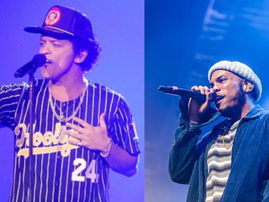 Andre Paak and Bruno Mars band together in their duo Silk Sonic. 