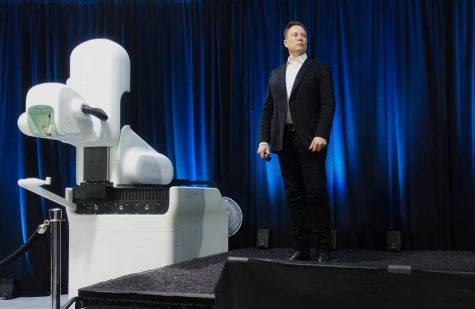 Neuralink co-founder Elon Musk displays the companies brain interface technology.