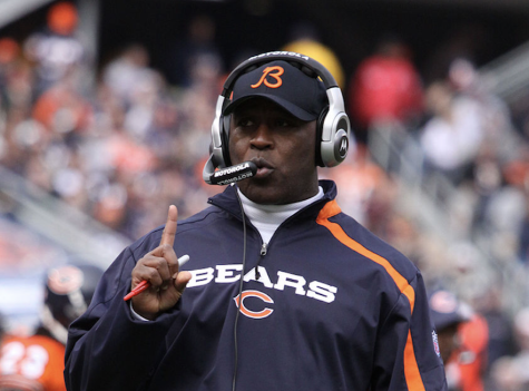 Former Chicago Bears head coach Lovie Smith coaches his team from the sideline.
