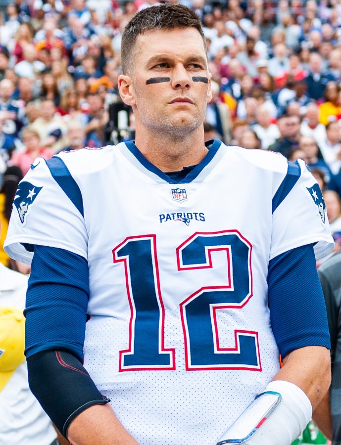 Tom Brady watches his defense from the sideline.