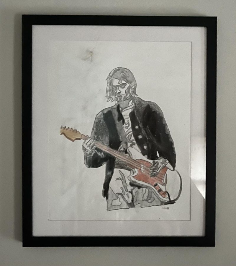 Pictured+above+is+a+drawn+portrait+of+Nirvana+frontman+and+guitarist+Kurt+Cobain+performing.+