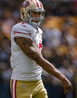 Kaepernick playing in a game for the San Francisco 49ers in 2012