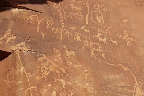 Park goers have scratched various names and insignias into ancient petroglyphs, vandalizing Valley of Fire State Park. 