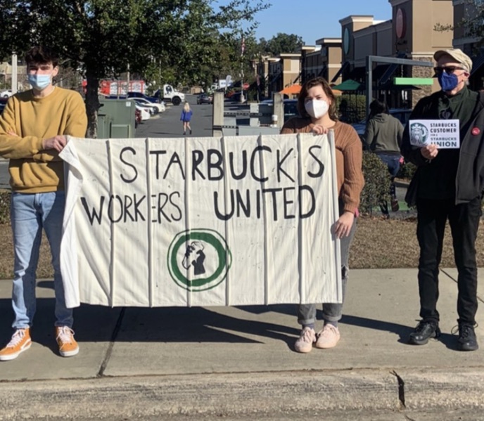 Starbucks workers protest outside of a store in Tallahassee.