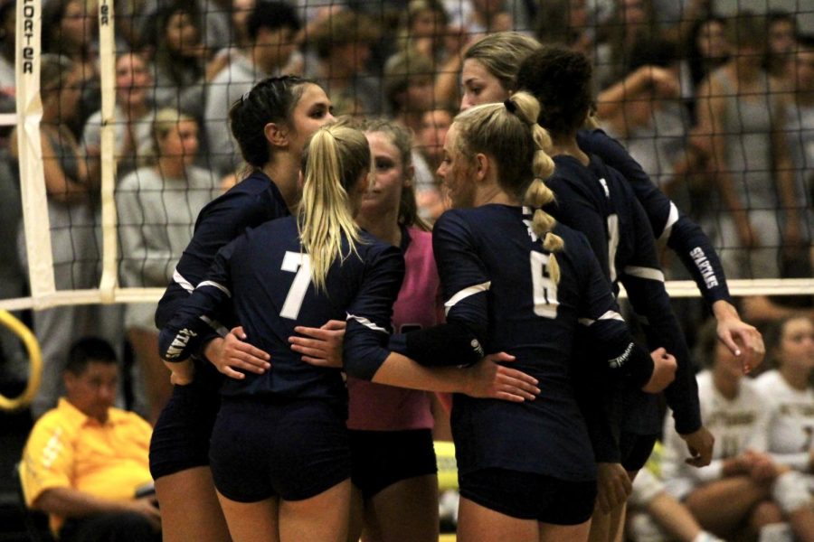 PV players huddle between points to stay focused and briefly communicate with each other. 