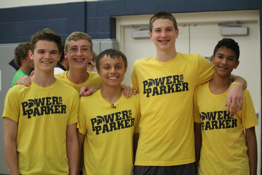 Kaffenberger smiles with Parker Kress and friends during their freshman year at an assembly in which students honored Kress by wearing Power for Parker t-shirts.