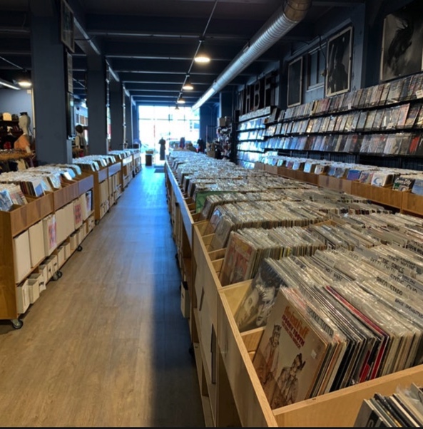 The inside of Ragged Records greets customers immediately with a variety of music genres in its physical form. 
