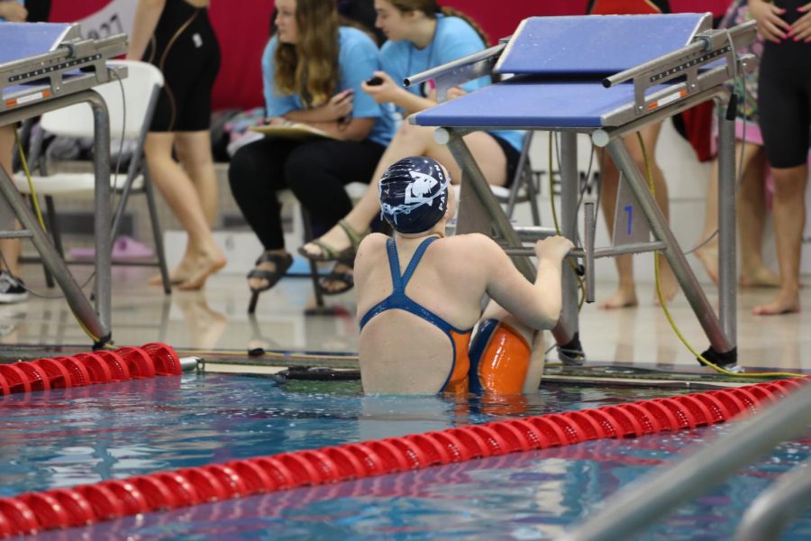 Senior Leah Patton gets ready for the first leg of the 200 medley relay before the start.