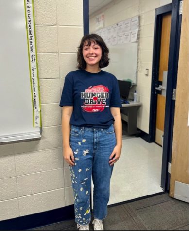 Senior spartan assembly executive, Leila Assadi, wearing the hunger drive shirt for the last day of the 2022 hunger drive.
