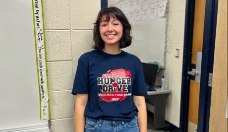 Senior spartan assembly executive, Leila Assadi, wearing the hunger drive shirt for the last day of the 2022 hunger drive.
