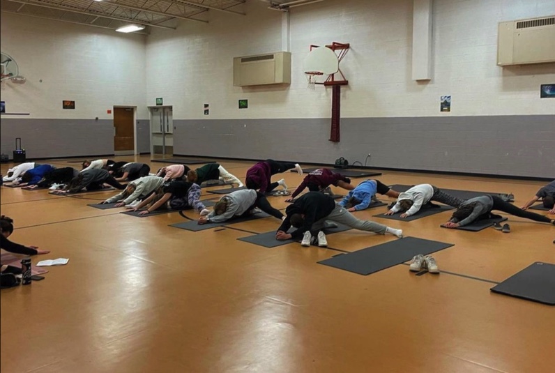 Students in the Orion and Rockridge High Schools’ Gray Matters Collective chapters practice yoga as a way of strengthening their mental health. 
