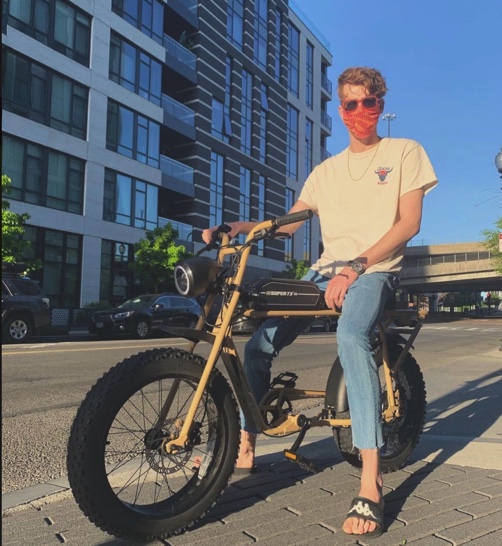  Boston resident Andrew Medema poses with his super73 electric bike