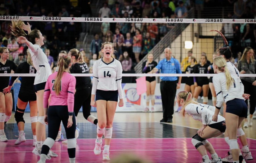 Senior Chloe Cline (14) of the Pleasant Valley Spartans celebrates a kill with her teammates during the State volleyball championship vs Iowa City Liberty on Nov. 3, 2022. 