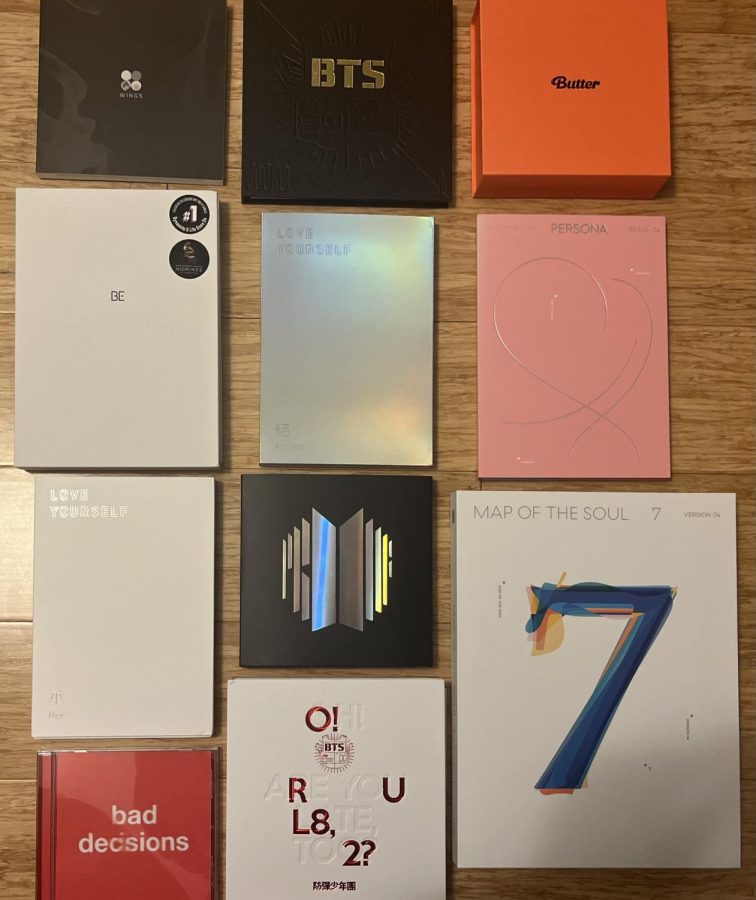 A mini collage of BTS albums represents just 11 of the nine studio albums, seven compilation albums, 11 singles and six extended plays the band has released since their debut in 2013.
