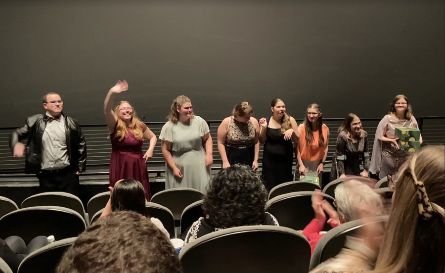 the cast of I Am Able receives a standing ovation at the premier of the documentary. 