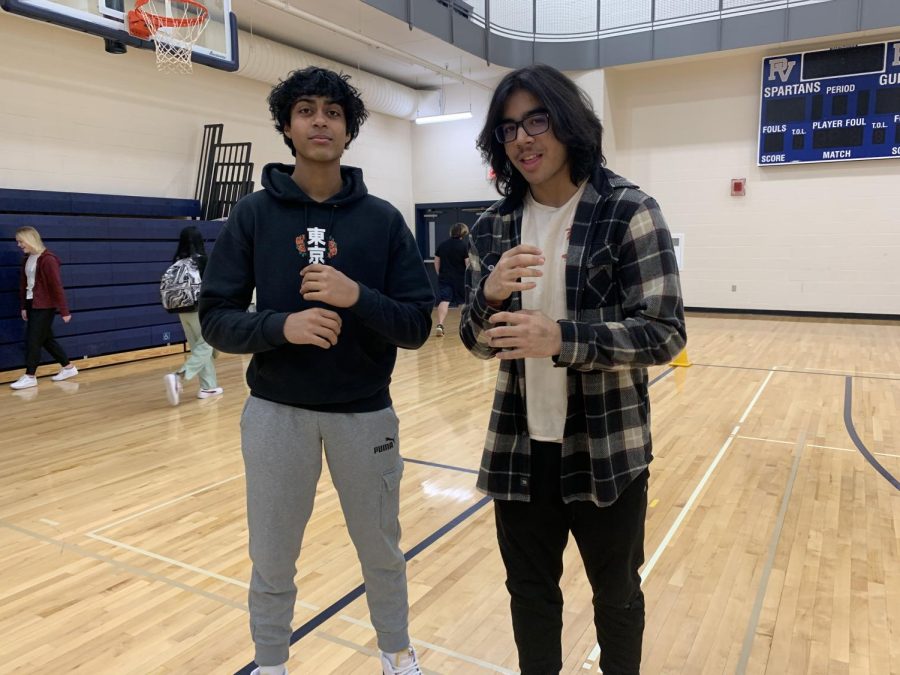 Juniors Armaan Bhagwat and Laksh Vashisht are captured in the moment as they do "the saltshaker," one of iSHOWSPEED's signature dance moves.