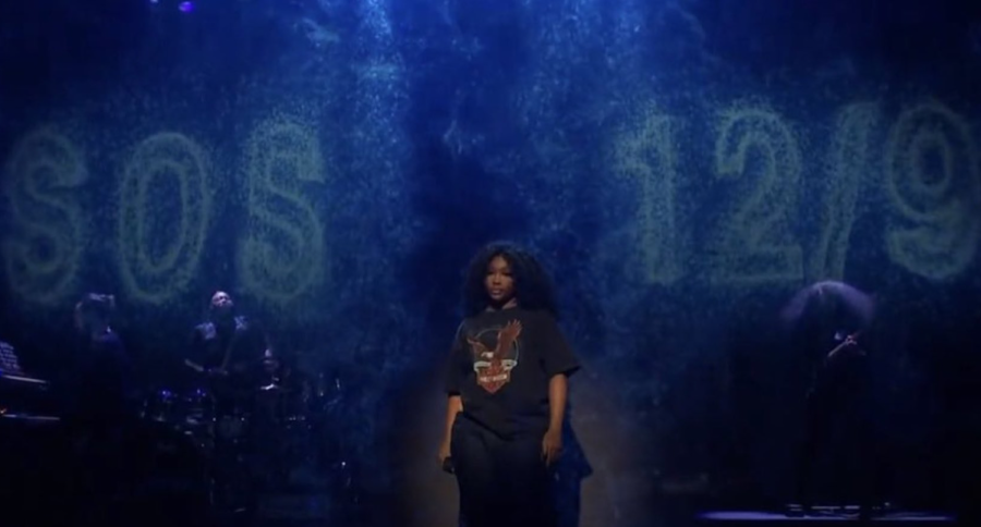 SZA hosts SNL, unexpectedly announced her new album ‘SOS’ and its release date on a screen displayed behind her performance.