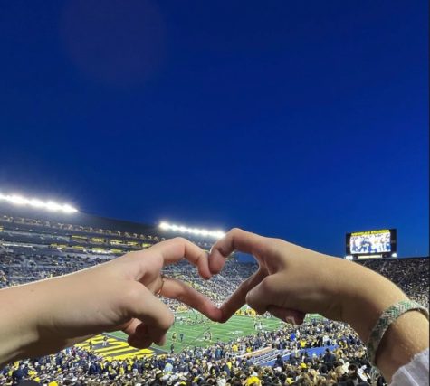 Football games at Michigan feature the “big house”, a stadium with a capacity of over one hundred thousand people.
