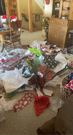 Wrapping paper leftover from Christmas fills houses, waiting to be dumped into landfills. 
