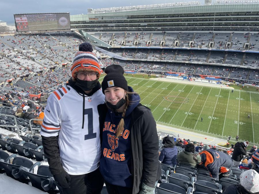 Chicago+Bears+fans%2C+PV+graduate+Parker+Hanson+and+Bettendorf+graduate+Lexi+Wentink%2C+pose+for+a+picture+at+Soldier+Field+on+Jan.+2%2C+2022.