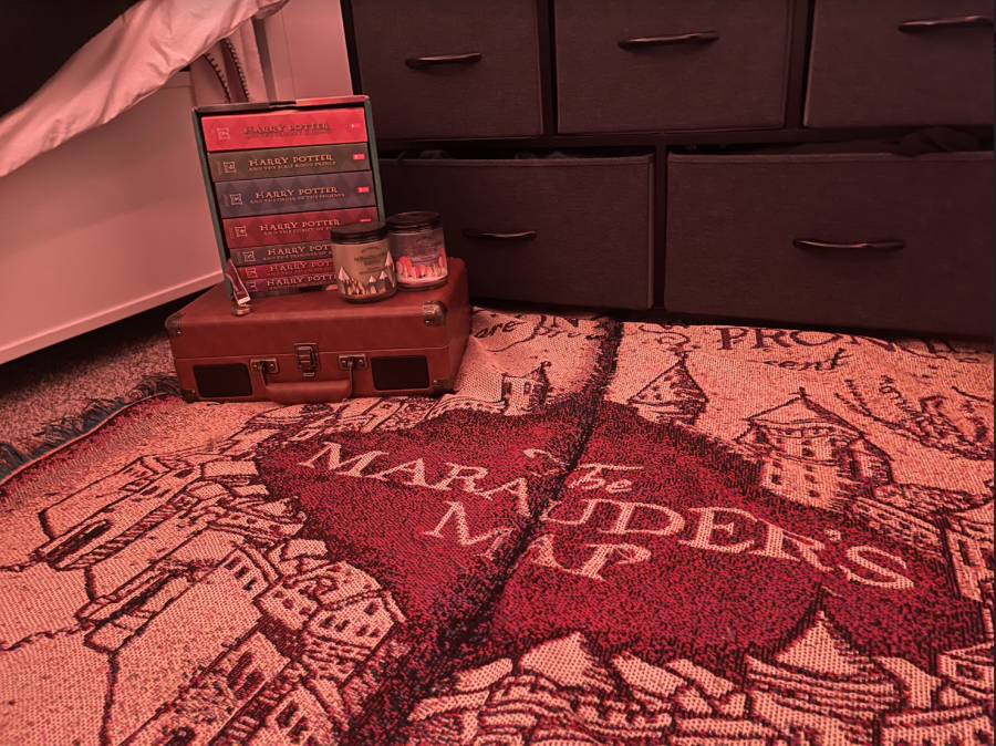 The world of Harry Potter comes to life with copies of the book series and merchandise.
