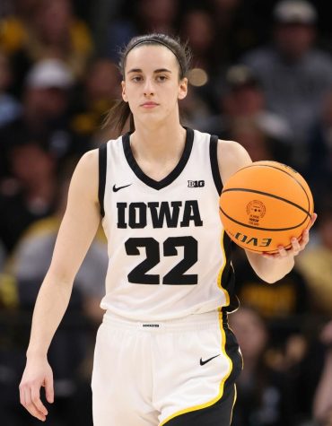 Caitlin Clark dribbles down the court in the playoff game against Ohio State, March 5, 2023. 