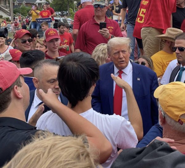 Former President Donald Trump made a public appearance at the Cy Hawk football game on Sept. 9 to increase his publicity for the Iowa Caucus. Photo credit to: Jayden Fairweather
