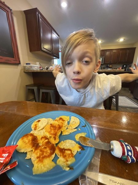 Easton Moran basks in the kitchen genius of his authentic, gourmet, home-style Mexican nachos.