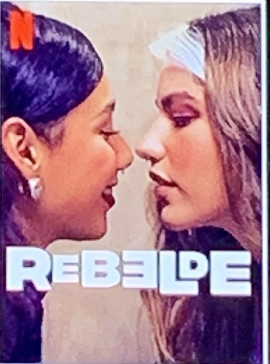 Queer characters in Rebelde shown potentially kissing as the cover photo however this moment doesn’t show until later in the series