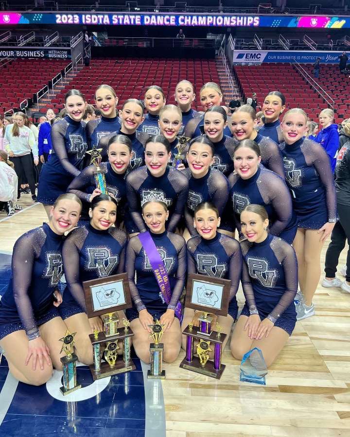 Pleasant Valley Platinum Dance team with their first place trophy after winning a 2022 state title in the Pom division. Photo credit to Aubrey Holst