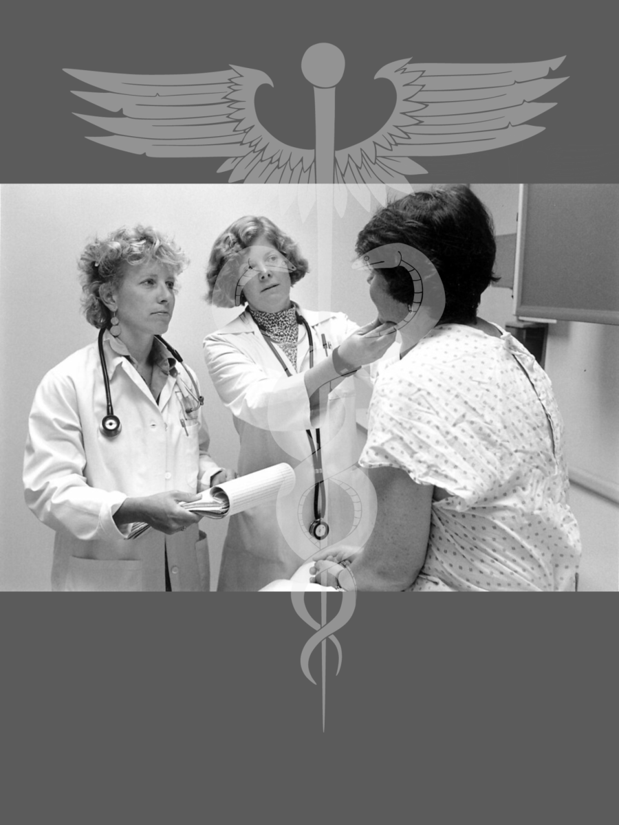 Two of 186,606 female doctors in 1999 helping treat a patient. 