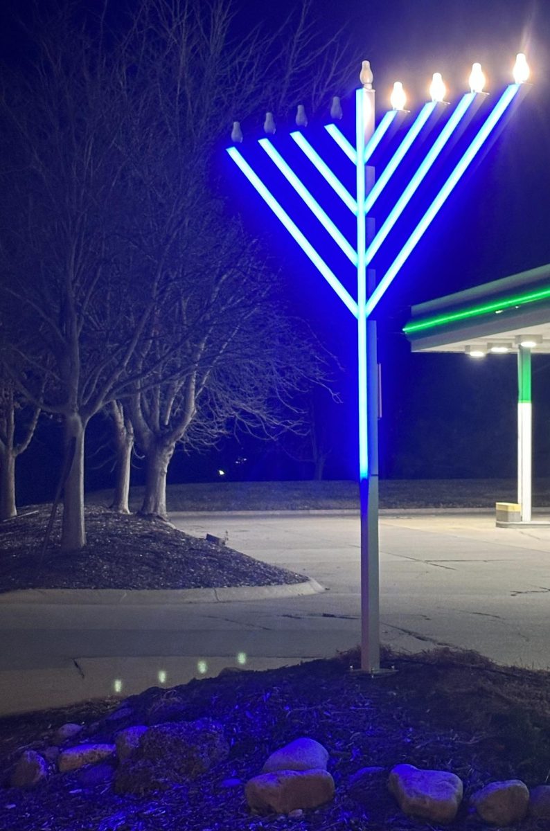 A menorah located outside of a local gas station celebrating Hanukkah