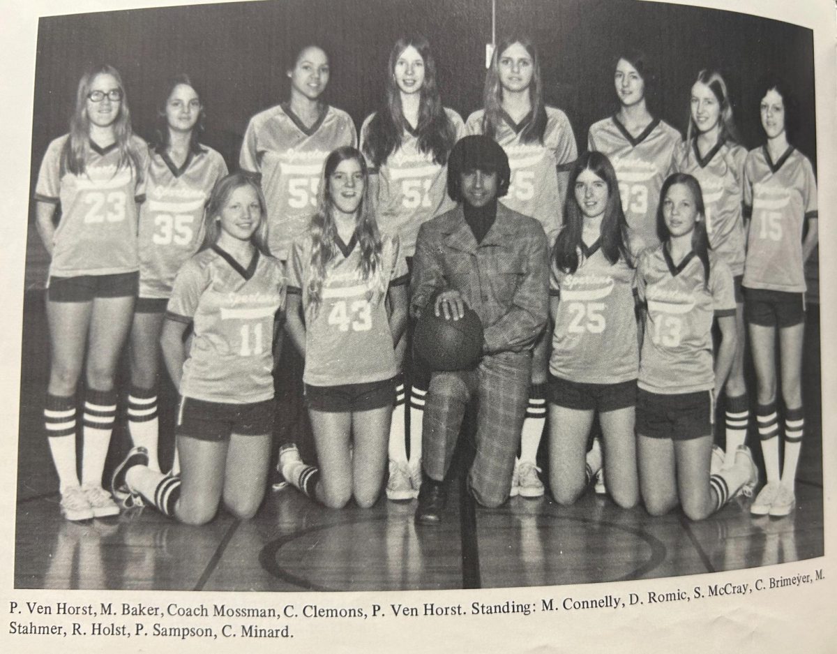 The first Pleasant Valley girls basketball varsity team poses for a team photo

