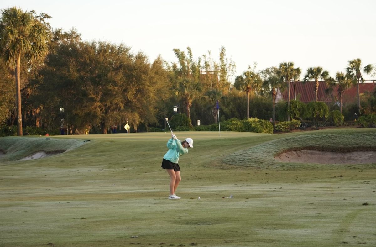 Senior Izzy Steele hits the links in Florida with her family instead of staying home for the holidays last winter. Photo credit to: Izzy Steele