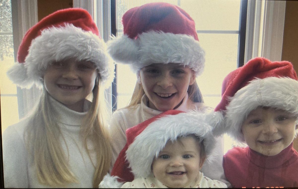 The Wilson family children are experiencing childlike Christmas joy. For many as they grow up, that joy fades away. Photo credit to Valorie Wilson