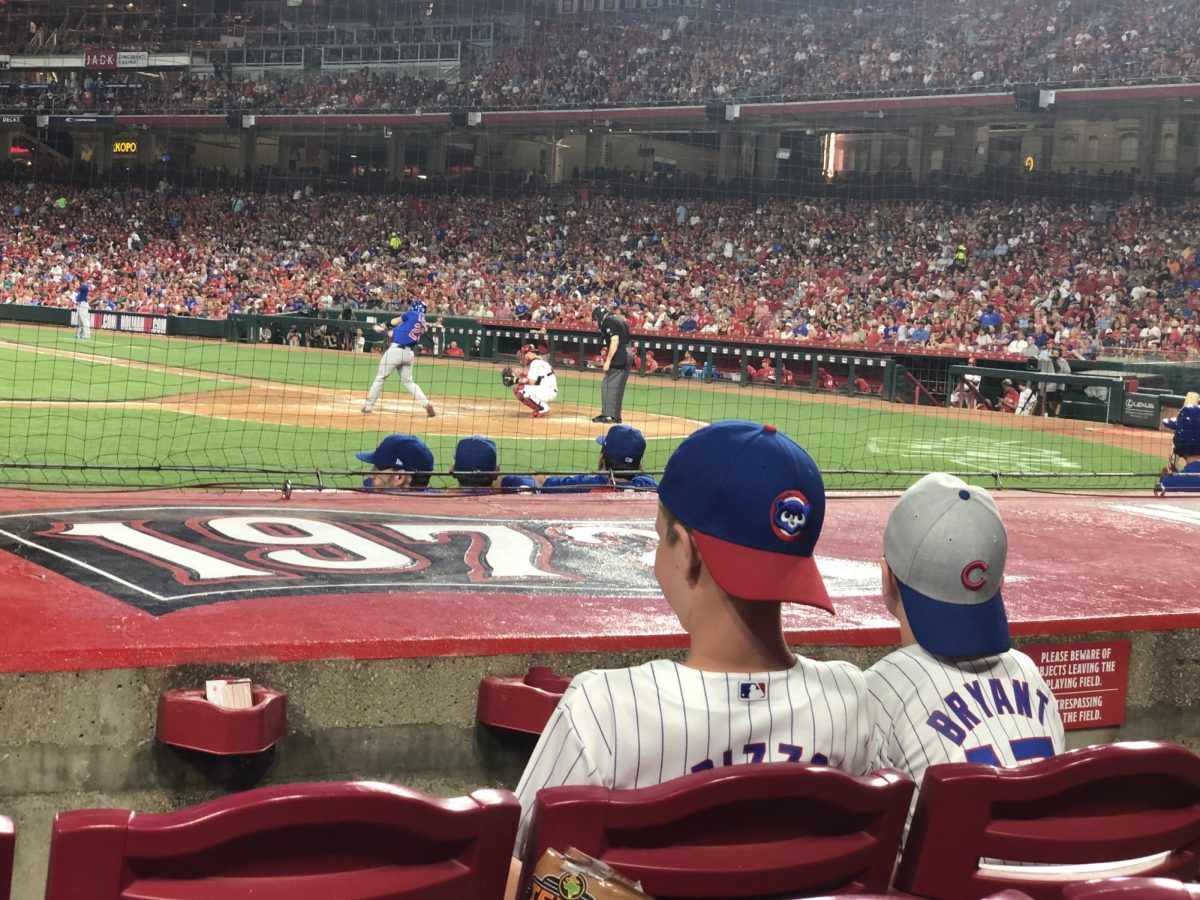 Two+young+fans+watch+the+Chicago+Cubs+take+on+the+Cincinnati+Reds+