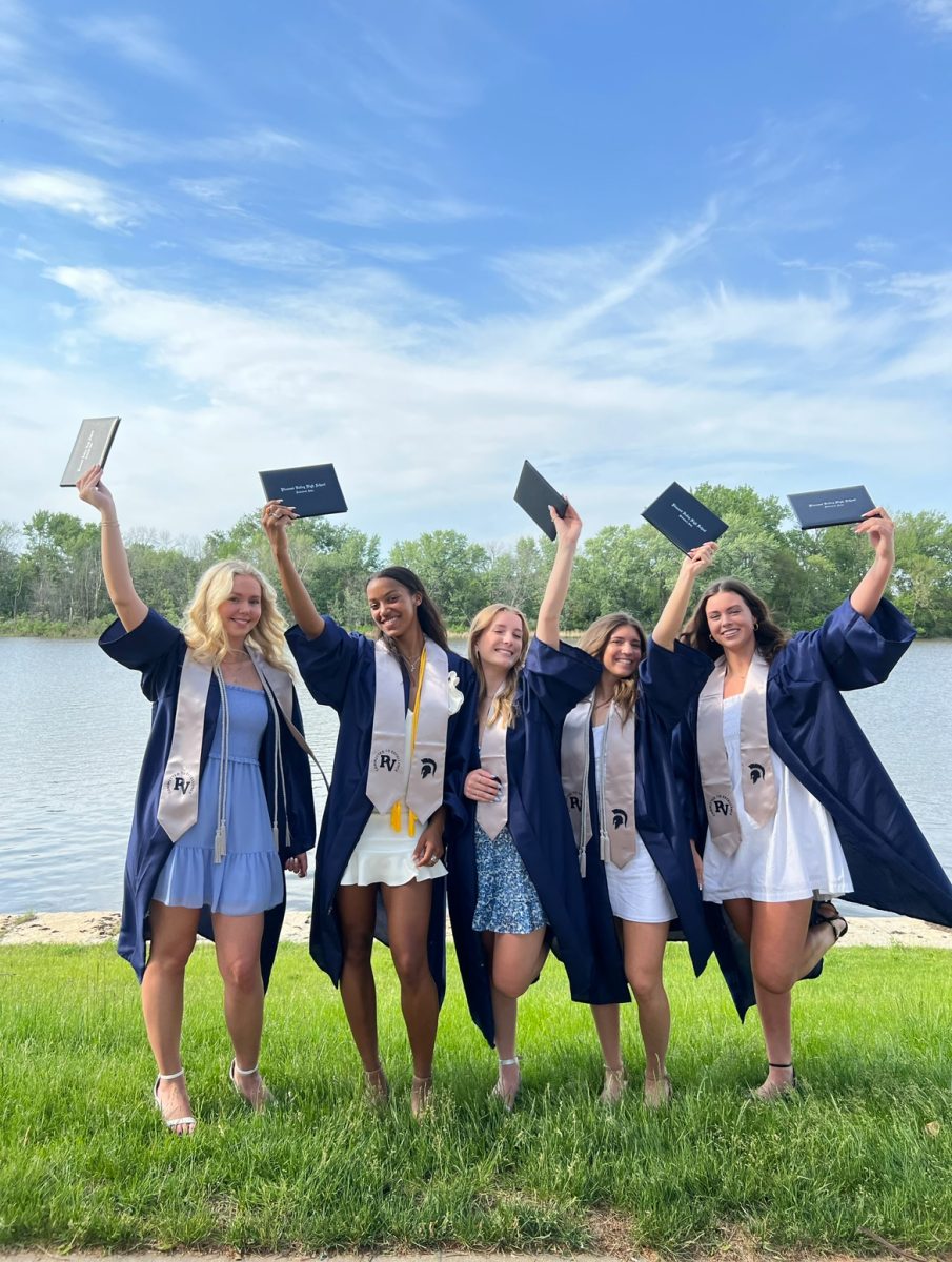 Pleasant Valley class of 2022 seniors pose after graduating from high school.