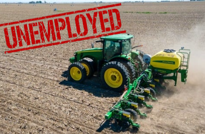 A John Deere tractor with an unemployed stamp on it.
