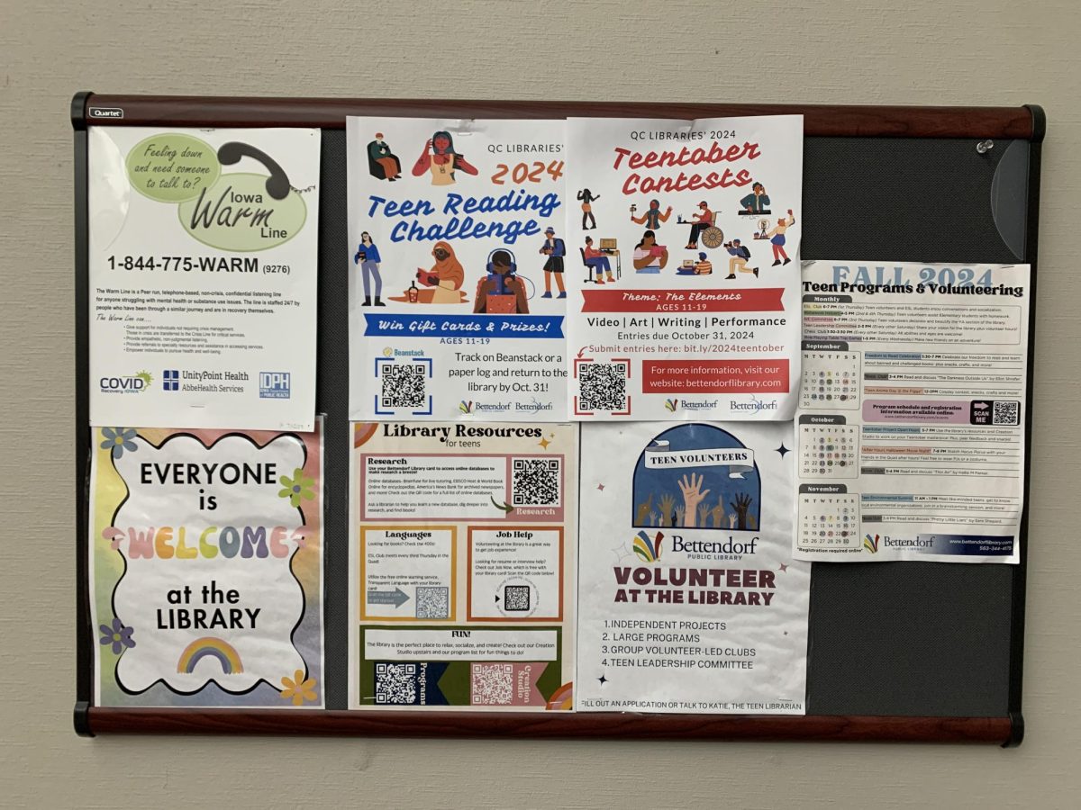 Librarian Katie Jackson uses the Bettendorf Public Library's teen quad area to advertise upcoming events and volunteer opportunities. 