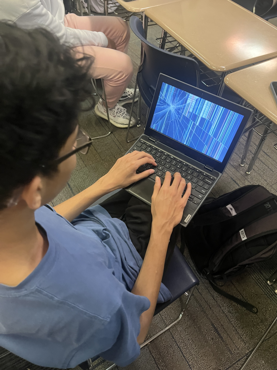 Student trying to fix outdated Chromebook with a broken screen