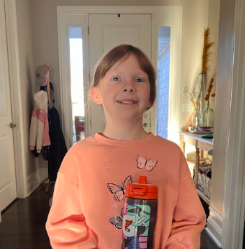 Fourth grader Evie Hoffman with her Mallory Swanson Gx Gatorade bottle. Players on Gatorade’s roster have inspired Hoffman to push herself farther than she thinks she can. 

Photo Credit: Shawna Hoffman