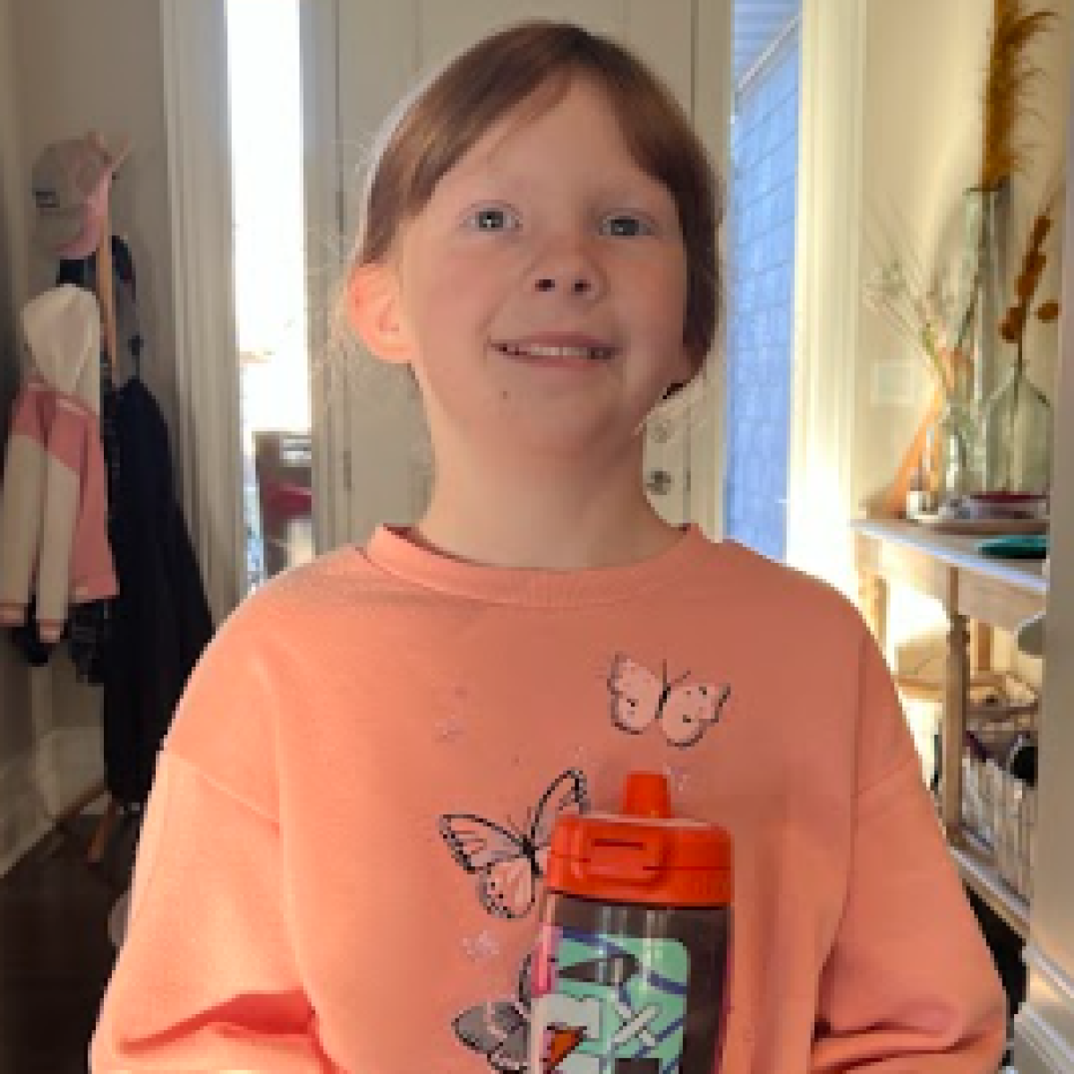 Fourth grader Evie Hoffman with her Mallory Swanson Gx Gatorade bottle. Players on Gatorade’s roster have inspired Hoffman to push herself farther than she thinks she can. 

Photo Credit: Shawna Hoffman