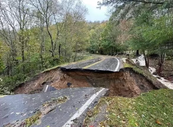 Hurricane Helene destroys a road in Boone, North Carolina. A long recovery awaits these affected areas. 

Photo Credit: David and Brenda Groleau